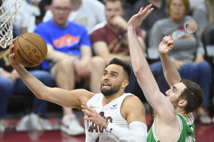 May 13, 2024; Cleveland, Ohio, USA; Cleveland Cavaliers guard Max Strus (1) drives to the basket beside Boston Celtics center Luke Kornet (40) in the third quarter of game four of the second round for the 2024 NBA playoffs at Rocket Mortgage FieldHouse. Credit: David Richard-USA TODAY Sports