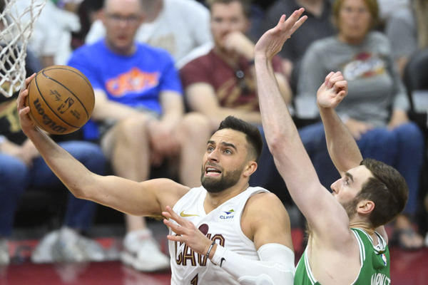 May 13, 2024; Cleveland, Ohio, USA; Cleveland Cavaliers guard Max Strus (1) drives to the basket beside Boston Celtics center Luke Kornet (40) in the third quarter of game four of the second round for the 2024 NBA playoffs at Rocket Mortgage FieldHouse. Mandatory Credit: David Richard-USA TODAY Sports