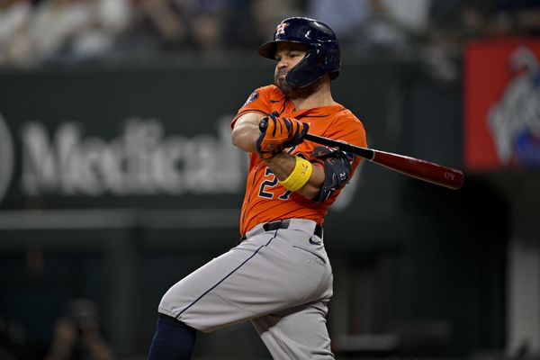 Sep 7, 2025; Arlington, Texas, USA; Houston Astros designated hitter Jose Altuve (27) at bat during the game between the Texas Rangers and the Houston Astros at Globe Life Field. Mandatory Credit: Jerome Miron-Imagn Images