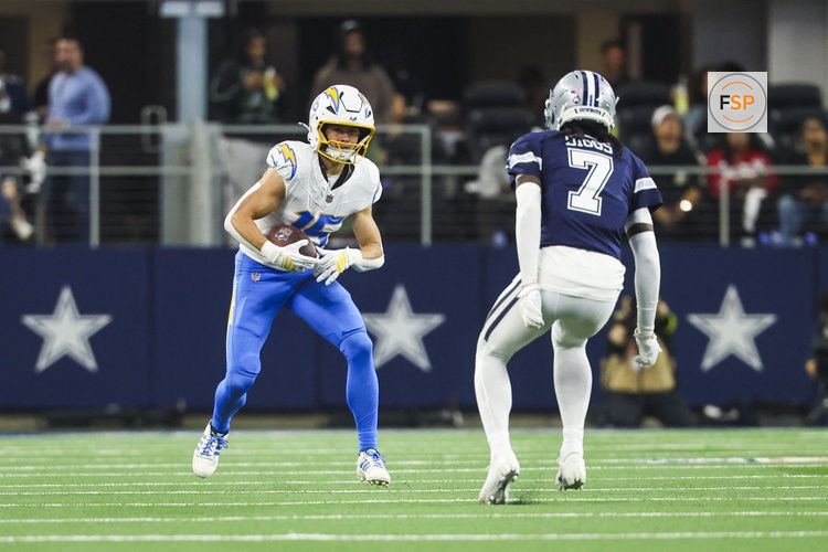 Dec 21, 2025; Arlington, Texas, USA; Los Angeles Chargers wide receiver Ladd McConkey (15) runs for yards after the catch against the Dallas Cowboys during the second quarter at AT&T Stadium. Credit: Kevin Jairaj-Imagn Images