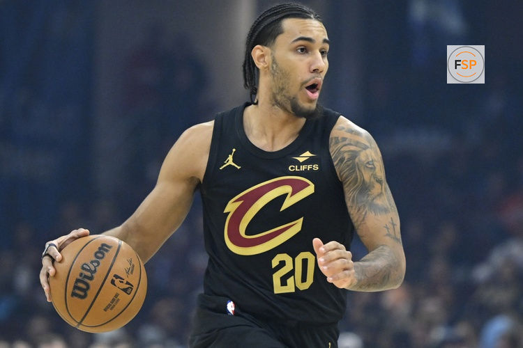 Dec 14, 2025; Cleveland, Ohio, USA; Cleveland Cavaliers guard Jaylon Tyson (20) brings the ball up court in the first quarter against the Charlotte Hornets at Rocket Arena. Credit: David Richard-Imagn Images