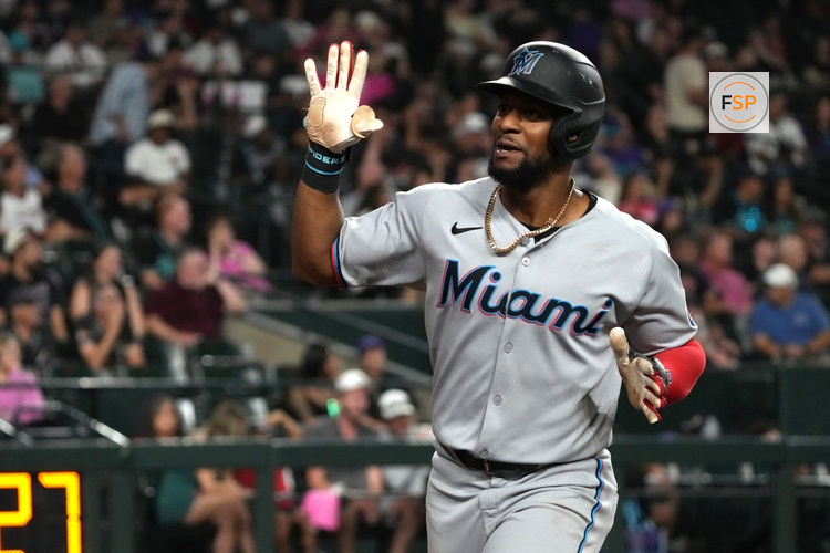Jun 27, 2025; Phoenix, Arizona, USA; Miami Marlins second base Otto Lopez (6) celebrates after hitting a two run home run against the Arizona Diamondbacks in the ninth inning at Chase Field. Credit: Rick Scuteri-Imagn Images