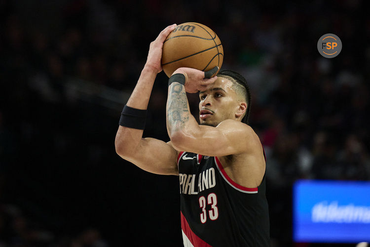 Feb 22, 2025; Portland, Oregon, USA; Portland Trail Blazers forward Toumani Camara (33) shoots a jump shot during the second half against the Charlotte Hornets at Moda Center. Credit: Troy Wayrynen-Imagn Images