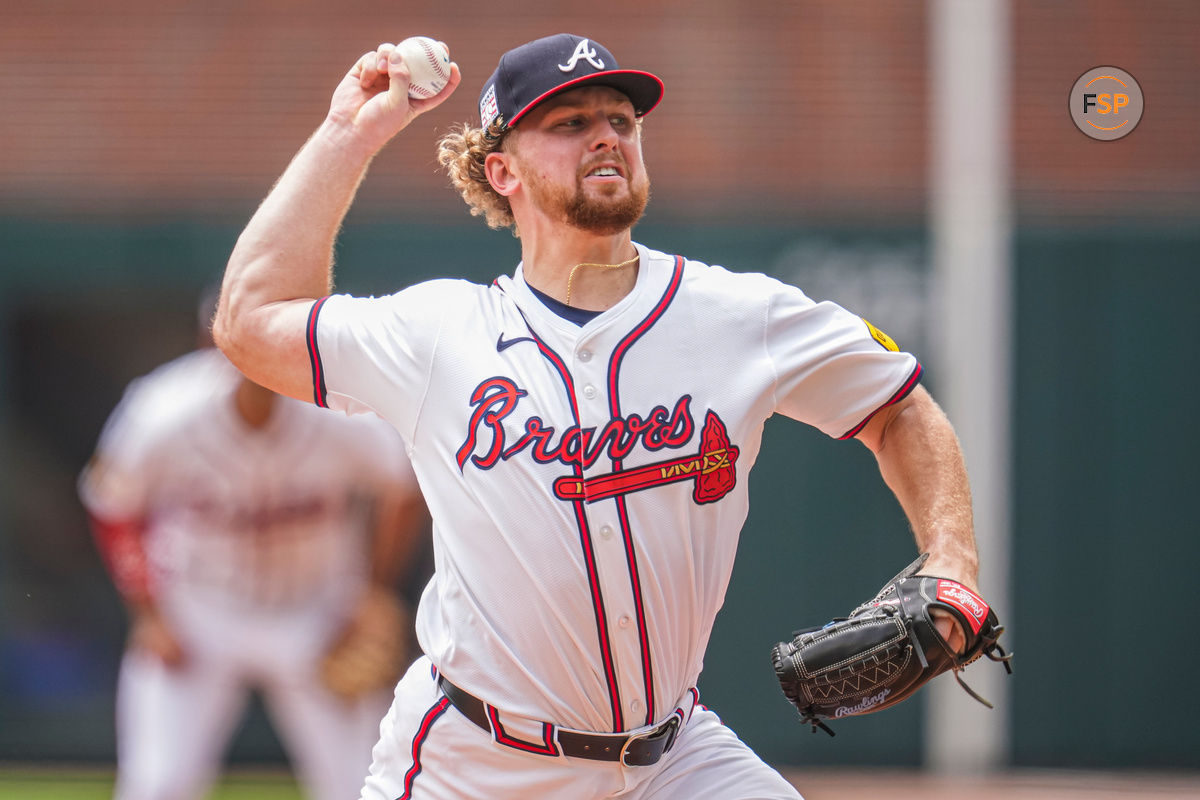 Jul 21, 2024; Cumberland, Georgia, USA; Atlanta Braves starting pitcher Spencer Schwellenbach (56) pitches against the St. Louis Cardinals during the first inning at Truist Park. Mandatory Credit: Dale Zanine-USA TODAY Sports