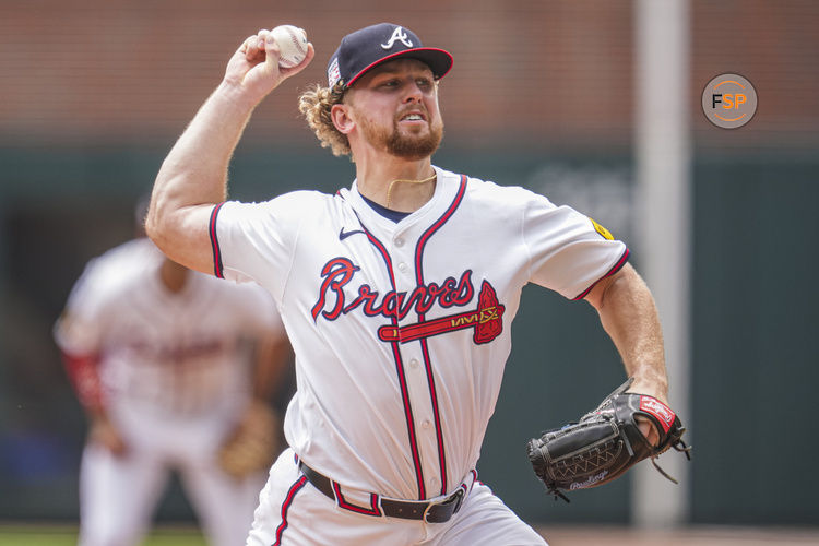 Jul 21, 2024; Cumberland, Georgia, USA; Atlanta Braves starting pitcher Spencer Schwellenbach (56) pitches against the St. Louis Cardinals during the first inning at Truist Park. Mandatory Credit: Dale Zanine-USA TODAY Sports