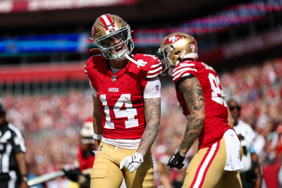 Nov 10, 2024; Tampa, Florida, USA; San Francisco 49ers wide receiver Ricky Pearsall (14) celebrates after scoring a touchdown against the Tampa Bay Buccaneers in the first quarter at Raymond James Stadium. Mandatory Credit: Nathan Ray Seebeck-Imagn Images