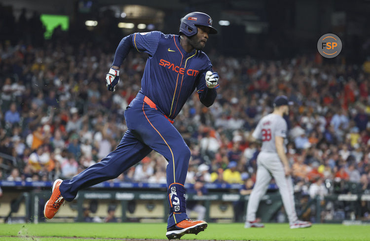 Aug 19, 2024; Houston, Texas, USA; Boston Red Sox starting pitcher Tanner Houck (89) reacts and Houston Astros designated hitter Yordan Alvarez (44) runs to first base on a double during the fourth inning at Minute Maid Park. Credit: Troy Taormina-USA TODAY Sports