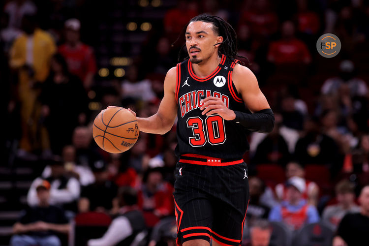 Mar 15, 2025; Houston, Texas, USA; Chicago Bulls guard Tre Jones (30) handles the ball against the Houston Rockets during the first quarter at Toyota Center. Credit: Erik Williams-Imagn Images