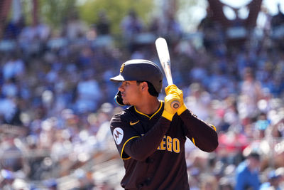 Feb 23, 2025; Phoenix, Arizona, USA; San Diego Padres catcher Ethan Salas (90) bats against the Los Angeles Dodgers during the second inning at Camelback Ranch-Glendale. Mandatory Credit: Joe Camporeale-Imagn Images