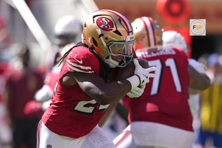 Oct 6, 2024; Santa Clara, California, USA; San Francisco 49ers running back Jordan Mason (24) carries the ball against the Arizona Cardinals during the second quarter at Levi's Stadium. Credit: Darren Yamashita-Imagn Images