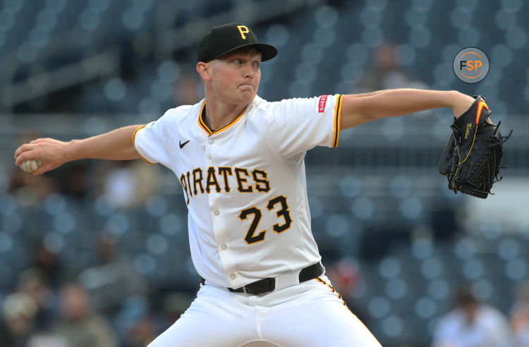 May 19, 2025; Pittsburgh, Pennsylvania, USA;  Pittsburgh Pirates starting pitcher Mitch Keller (23) delivers a pitch against the Cincinnati Reds during the first inning at PNC Park. Credit: Charles LeClaire-Imagn Images