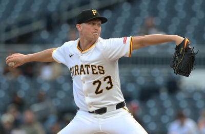 May 19, 2025; Pittsburgh, Pennsylvania, USA;  Pittsburgh Pirates starting pitcher Mitch Keller (23) delivers a pitch against the Cincinnati Reds during the first inning at PNC Park. Mandatory Credit: Charles LeClaire-Imagn Images