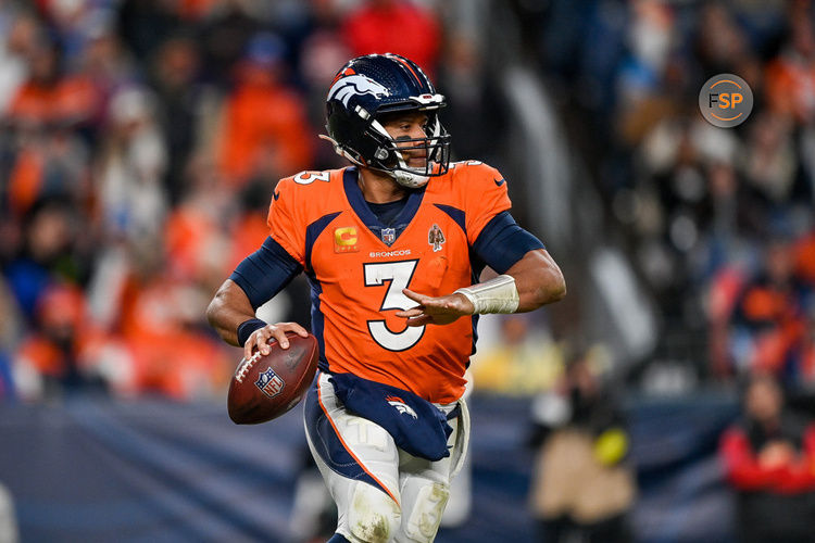 DENVER, CO - JANUARY 8: Denver Broncos quarterback Russell Wilson (3) rolls out of the pocket during a game between the Los Angeles Chargers and the Denver Broncos at Empower Field at Mile High on January 8, 2023 in Denver, Colorado. (Photo by Dustin Bradford/Icon Sportswire)