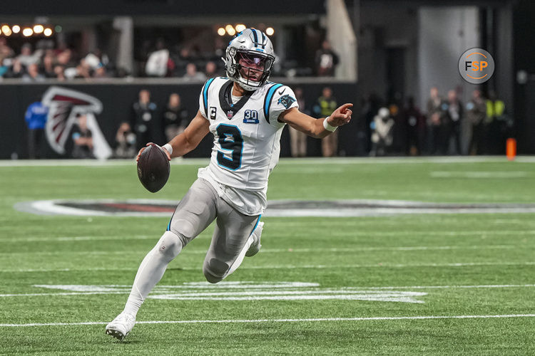 Jan 5, 2025; Atlanta, Georgia, USA; Carolina Panthers quarterback Bryce Young (9) runs for a touchdown against the Atlanta Falcons during the second half at Mercedes-Benz Stadium. Credit: Dale Zanine-Imagn Images