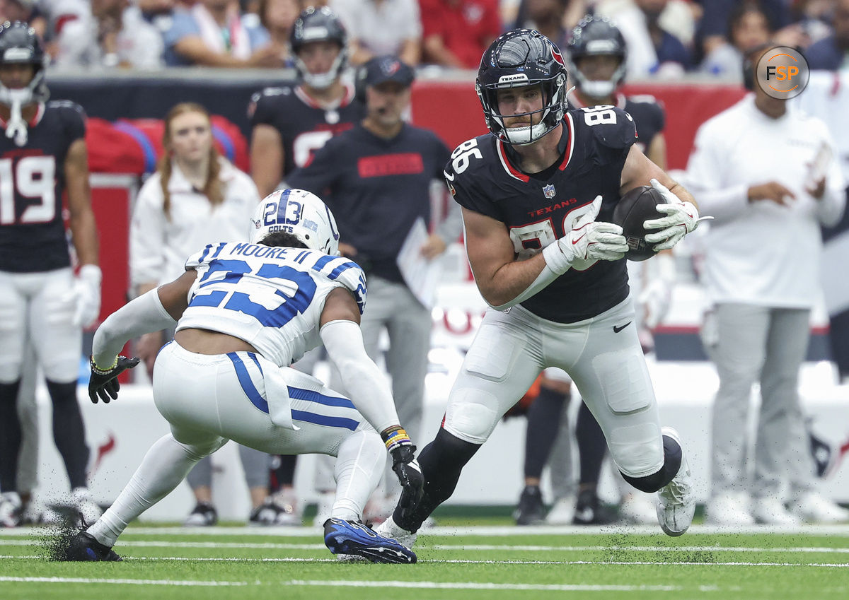 Oct 27, 2024; Houston, Texas, USA; Houston Texans tight end Dalton Schultz (86) makes a reception as Indianapolis Colts cornerback Kenny Moore II (23) defends during the second quarter at NRG Stadium. Credit: Troy Taormina-Imagn Images