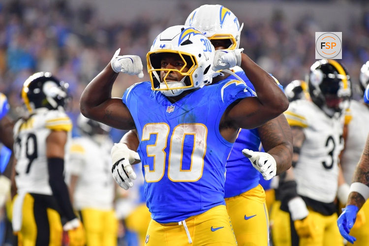 Nov 9, 2025; Inglewood, California, USA; Los Angeles Chargers running back Kimani Vidal (30) celebrates after scoring a touchdown against the Pittsburgh Steelers during the fourth quarter of the game at SoFi Stadium. Credit: Gary A. Vasquez-Imagn Images