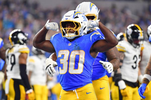 Nov 9, 2025; Inglewood, California, USA; Los Angeles Chargers running back Kimani Vidal (30) celebrates after scoring a touchdown against the Pittsburgh Steelers during the fourth quarter of the game at SoFi Stadium. Mandatory Credit: Gary A. Vasquez-Imagn Images