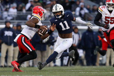 Nov 30, 2024; University Park, Pennsylvania, USA; (Editors Notes: Caption Correction) Penn State Nittany Lions defensive end Abdul Carter (11) pressures Maryland Terrapins quarterback MJ Morris (7) during the first quarter at Beaver Stadium. Mandatory Credit: Matthew O'Haren-Imagn Images