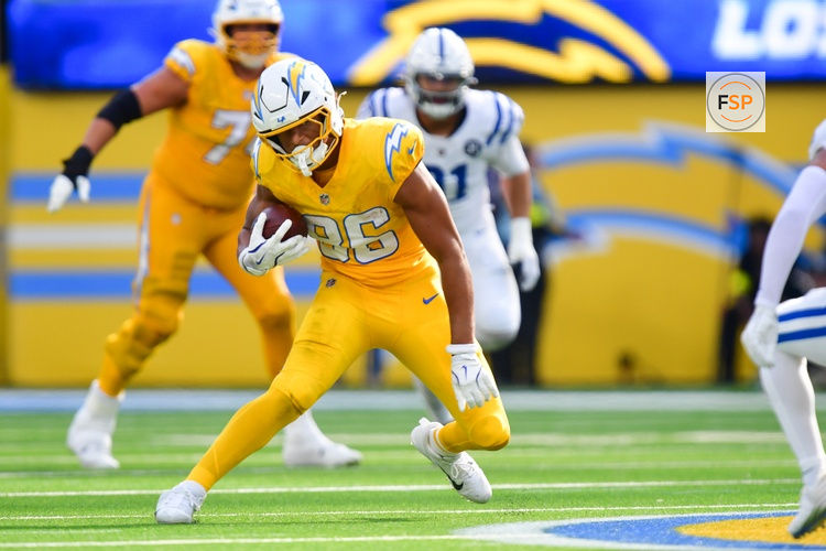Oct 19, 2025; Inglewood, California, USA; Los Angeles Chargers tight end Oronde Gadsden (86) runs with the ball in the second half against the Indianapolis Colts at SoFi Stadium. Credit: Gary A. Vasquez-Imagn Images