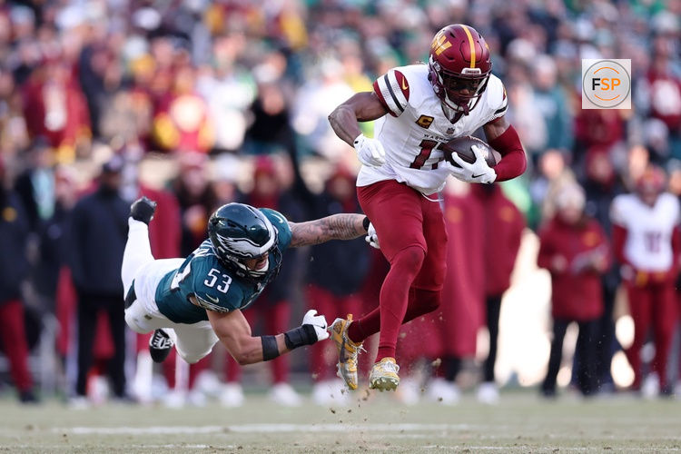 Jan 26, 2025; Philadelphia, PA, USA; Washington Commanders wide receiver Terry McLaurin (17) evades the tackle of Philadelphia Eagles linebacker Zack Baun (53) during the first half in the NFC Championship game at Lincoln Financial Field. Credit: Bill Streicher-Imagn Images