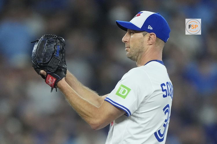 Nov 1, 2025; Toronto, Ontario, CAN; Toronto Blue Jays pitcher Max Scherzer (31) pitches against the Los Angeles Dodgers in the first inning during game seven of the 2025 MLB World Series at Rogers Centre. Credit: John E. Sokolowski-Imagn Images