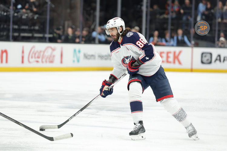 Jan 31, 2025; Salt Lake City, Utah, USA;  Columbus Blue Jackets right wing Kirill Marchenko (86) controls the puck during the first period against the Utah Hockey Club at Delta Center. Credit: Chris Nicoll-Imagn Images