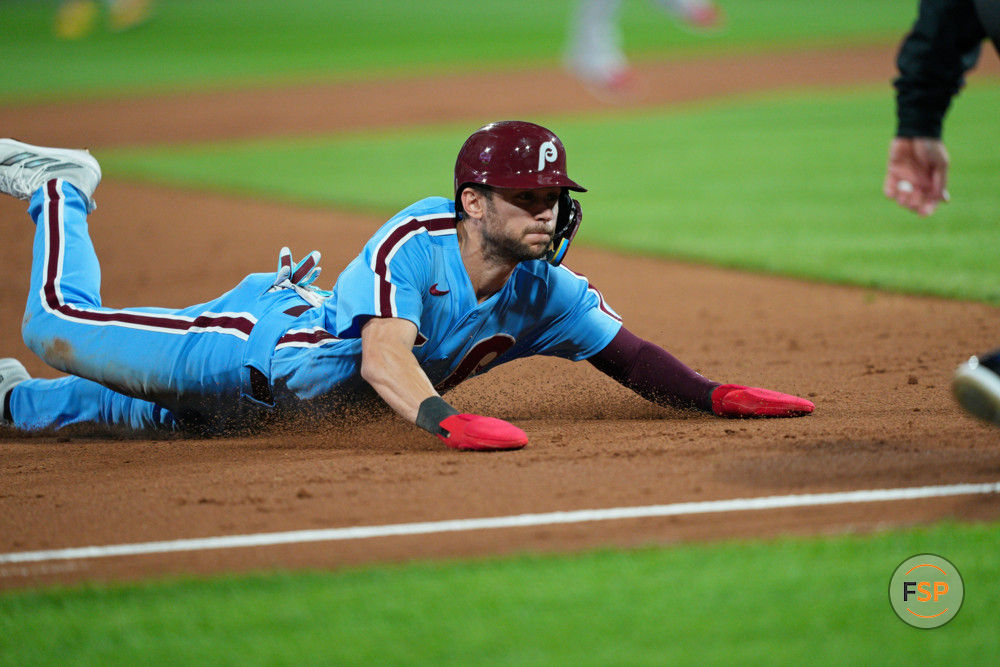 PHILADELPHIA, PA - OCTOBER 12: Philadelphia Phillies shortstop Trea Turner (7) is safe at third during game four of the NLDS game between the Atlanta Braves and the Philadelphia Phillies on October 12, 2023, at Citizens Bank Park. (Photo by Andy Lewis/Icon Sportswire)
