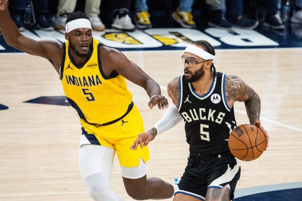 Nov 3, 2025; Indianapolis, Indiana, USA; Milwaukee Bucks guard Gary Trent Jr. (5) dribbles against Indiana Pacers forward Jarace Walker (5) in the first half at Gainbridge Fieldhouse. Mandatory Credit: Trevor Ruszkowski-Imagn Images