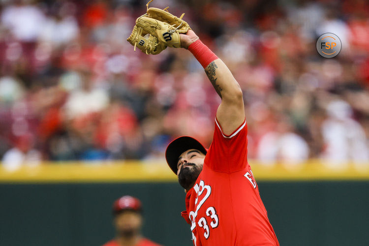 Jun 7, 2025; Cincinnati, Ohio, USA; Cincinnati Reds third baseman Christian Encarnacion-Strand (33) catches a pop up hit by Arizona Diamondbacks shortstop Geraldo Perdomo (not pictured) in the fifth inning at Great American Ball Park. Credit: Katie Stratman-Imagn Images