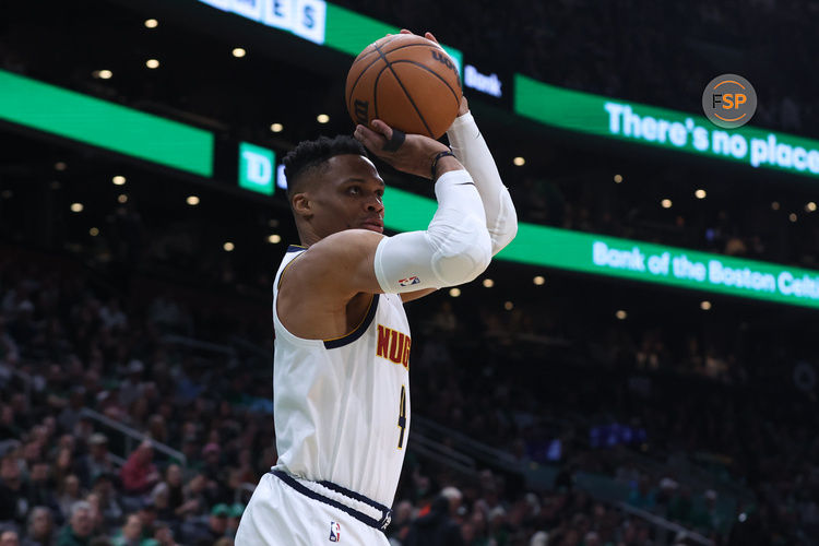 Mar 2, 2025; Boston, Massachusetts, USA;  Denver Nuggets guard Russell Westbrook (4) shoots during the first half against the Boston Celtics at TD Garden. Credit: Paul Rutherford-Imagn Images