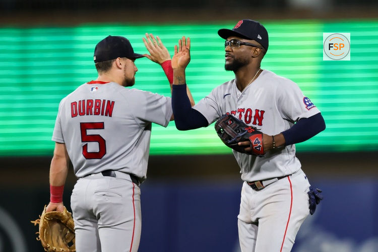 Jul 29, 2026; West Sacramento, California, USA; Boston Red Sox third baseman Caleb Durbin (5) celebrates with third baseman Caleb Durbin (5) after the game aAthletics at Sutter Health Park. Credit: Sergio Estrada-Imagn Images