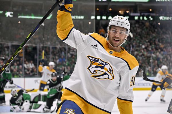 Feb 28, 2026; Dallas, Texas, USA; Nashville Predators left wing Michael Bunting (58) celebrates scoring a power play goal against Dallas Stars goaltender Jake Oettinger (29) during the first period at the American Airlines Center. Mandatory Credit: Jerome Miron-Imagn Images