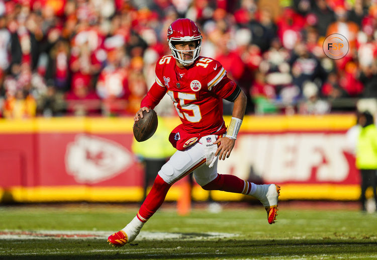 Dec 21, 2024; Kansas City, Missouri, USA; Kansas City Chiefs quarterback Patrick Mahomes (15) rolls out to pass during the first half against the Houston Texans at GEHA Field at Arrowhead Stadium. Credit: Jay Biggerstaff-Imagn Images