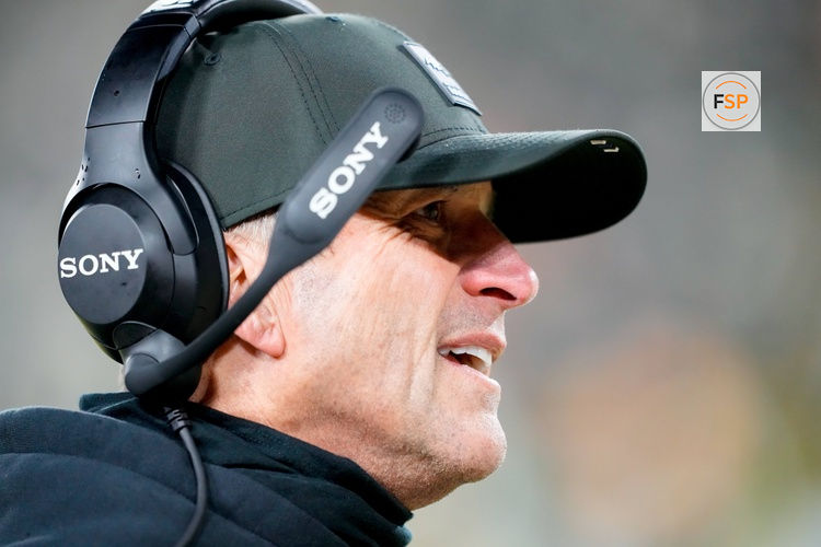 Dec 27, 2025; Green Bay, Wisconsin, USA; Baltimore Ravens head coach John Harbaugh is seen during the second quarter against the Green Bay Packers at Lambeau Field. Credit: Jeff Hanisch-Imagn Images