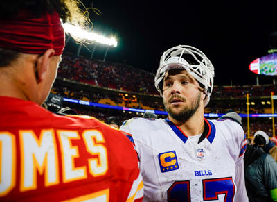 Dec 10, 2023; Kansas City, Missouri, USA; Buffalo Bills quarterback Josh Allen (17) talks with Kansas City Chiefs quarterback Patrick Mahomes (15) after a game  at GEHA Field at Arrowhead Stadium. Mandatory Credit: Jay Biggerstaff-USA TODAY Sports