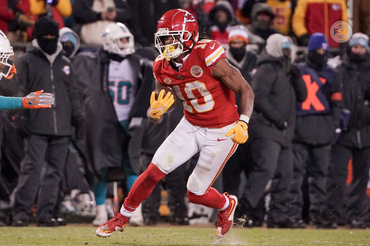 Jan 13, 2024; Kansas City, Missouri, USA; Kansas City Chiefs running back Isiah Pacheco (10) runs the ball against the Miami Dolphins in a 2024 AFC wild card game at GEHA Field at Arrowhead Stadium. Credit: Denny Medley-USA TODAY Sports