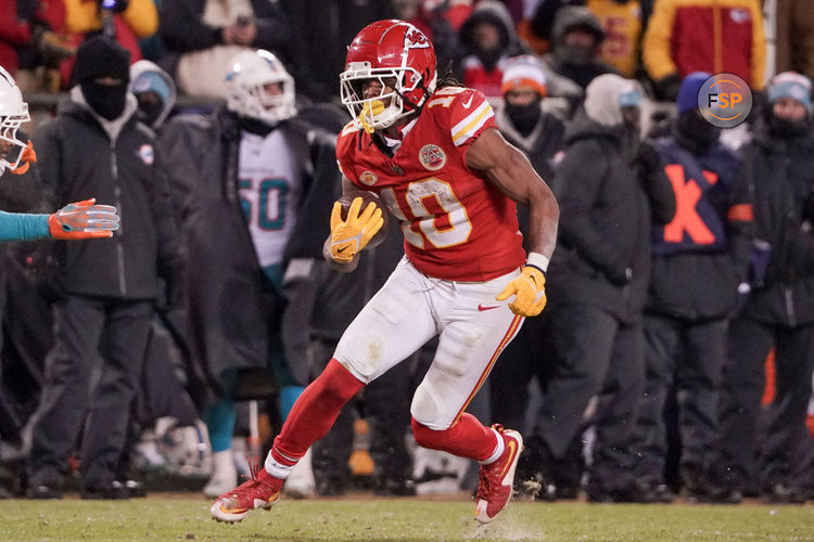 Jan 13, 2024; Kansas City, Missouri, USA; Kansas City Chiefs running back Isiah Pacheco (10) runs the ball against the Miami Dolphins in a 2024 AFC wild card game at GEHA Field at Arrowhead Stadium. Credit: Denny Medley-USA TODAY Sports