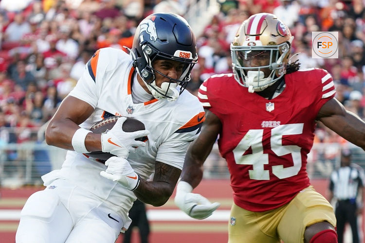 Aug 9, 2025; Santa Clara, California, USA;  Denver Broncos wide receiver Devaughn Vele (17) make a reception in the second quarter against San Francisco 49ers linebacker Nick Martin (45) at Levi's Stadium. Credit: David Gonzales-Imagn Images