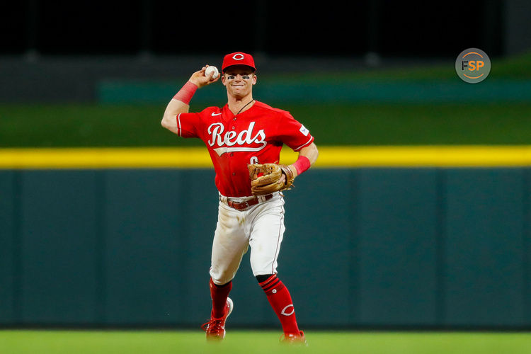 Aug 19, 2023; Cincinnati, Ohio, USA; Cincinnati Reds second baseman Matt McLain (9) throws to first in the eighth inning at Great American Ball Park. Credit: Katie Stratman-USA TODAY Sports