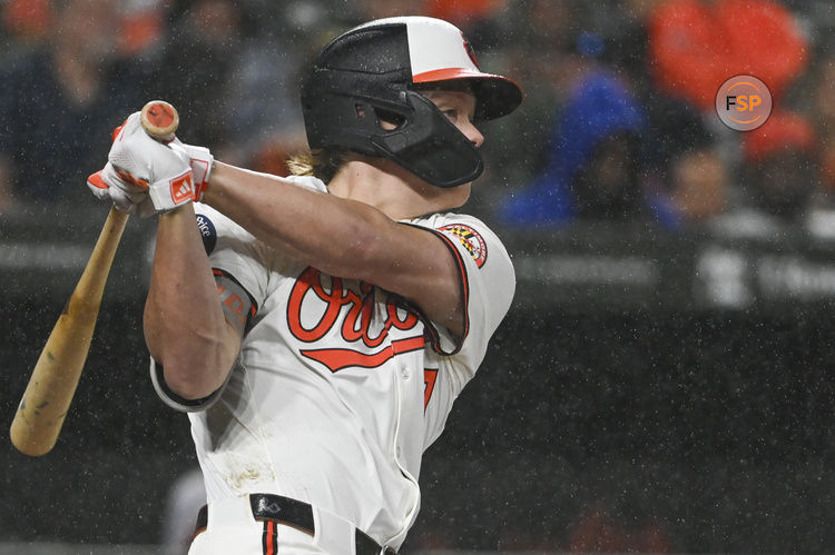 Sep 18, 2024; Baltimore, Maryland, USA;  Baltimore Orioles second base Jackson Holliday (7) swings through a third inning single against the San Francisco Giants at Oriole Park at Camden Yards. Credit: Tommy Gilligan-Imagn Images