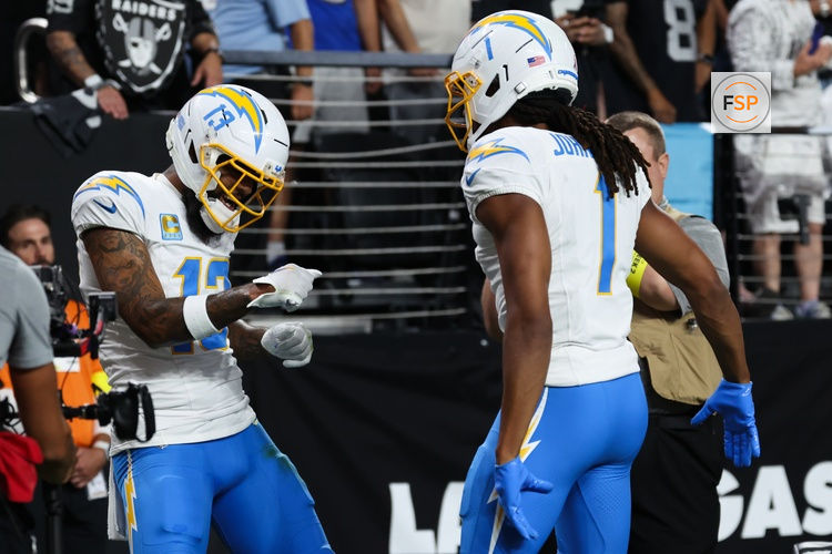 Sep 15, 2025; Paradise, Nevada, USA; Los Angeles Chargers wide receiver Keenan Allen (13) celebrates with Los Angeles Chargers wide receiver Quentin Johnston (1) after scoring a touchdown during the first quarter against the Las Vegas Raiders at Allegiant Stadium. Credit: Kiyoshi Mio-Imagn Images