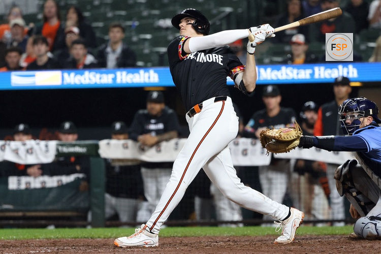 Jun 27, 2025; Baltimore, Maryland, USA; Baltimore Orioles third baseman Coby Mayo (16) hits a home run during the eighth inning against the Tampa Bay Rays at Oriole Park at Camden Yards. Credit: Daniel Kucin Jr.-Imagn Images