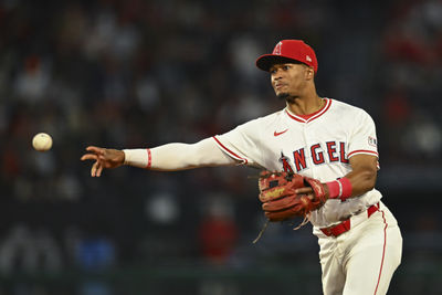 Apr 19, 2025; Anaheim, California, USA; Los Angeles Angels second baseman Kyren Paris (19) fields the ball against the San Francisco Giants during the ninth inning at Angel Stadium. Mandatory Credit: Jonathan Hui-Imagn Images