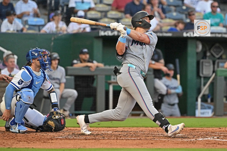 Sep 3, 2026; Kansas City, Missouri, USA;  Miami Marlins first baseman Kyle Stowers (28) hits a double in the third inning against the Kansas City Royals at Kauffman Stadium.  Credit: Peter Aiken-Imagn Images