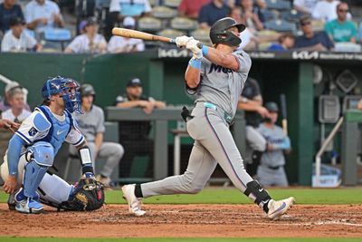 Sep 3, 2026; Kansas City, Missouri, USA;  Miami Marlins first baseman Kyle Stowers (28) hits a double in the third inning against the Kansas City Royals at Kauffman Stadium.  Mandatory Credit: Peter Aiken-Imagn Images