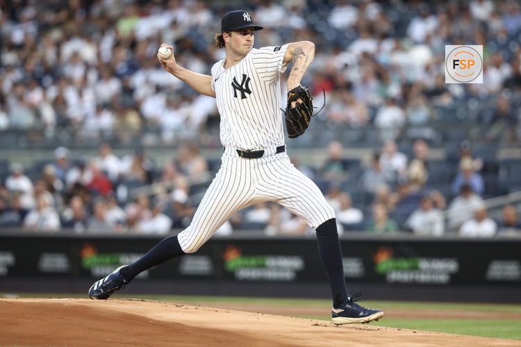 Jul 9, 2025; Bronx, New York, USA;  New York Yankees starting pitcher Cam Schlitter (31) pitches in the first inning against the against the Seattle Mariners at Yankee Stadium. Credit: Wendell Cruz-Imagn Images