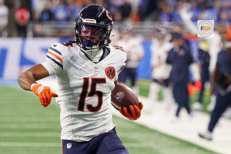 Sep 14, 2025; Detroit, Michigan, USA; Chicago Bears wide receiver Rome Odunze (15) carries the ball for a touchdown against the Detroit Lions during the first quarter at Ford Field. Credit: David Reginek-Imagn Images