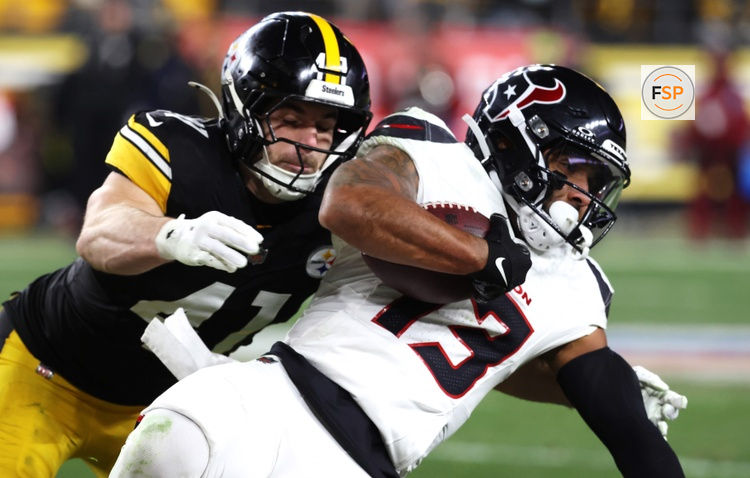 Jan 12, 2026; Pittsburgh, PA, USA; Pittsburgh Steelers linebacker Payton Wilson (41) tackles Houston Texans wide receiver Christian Kirk (13) during the first half of an AFC Wild Card Round game at Acrisure Stadium. Credit: Charles LeClaire-Imagn Images