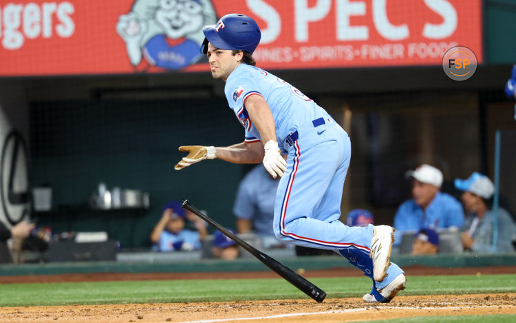 Jun 15, 2025; Arlington, Texas, USA;  Texas Rangers designated hitter Josh Smith (8) hits a single during the fifth inning against the Chicago White Sox at Globe Life Field. Credit: Kevin Jairaj-Imagn Images