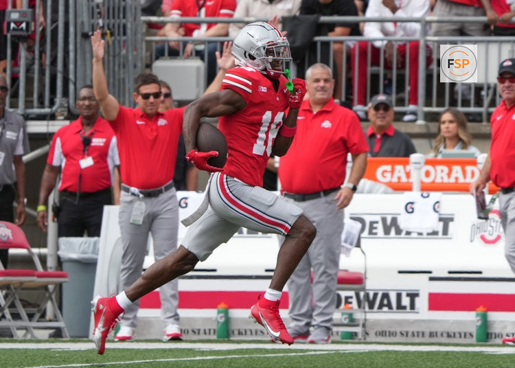 COLUMBUS, OH - SEPTEMBER 09: Wide receiver Marvin Harrison Jr. #18 of the Ohio State Buckeyes runs with the ball during the first half against the Youngstown State Penguins at Ohio Stadium in Columbus, Ohio on September 9, 2023. (Photo by Jason Mowry/Icon Sportswire)